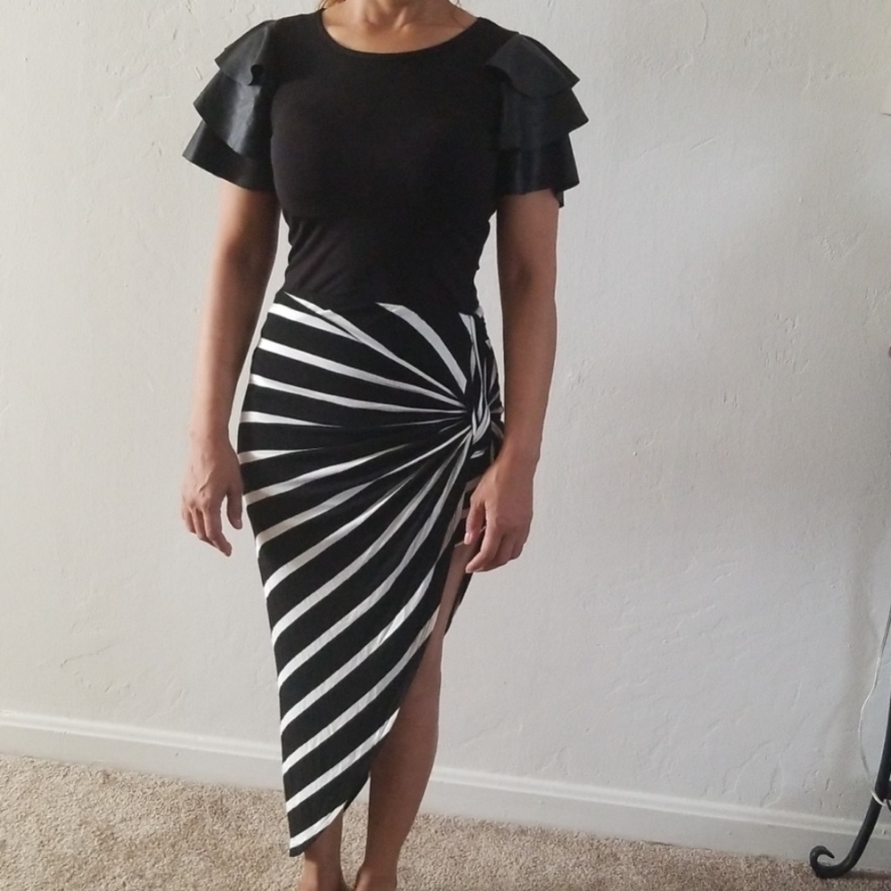 Beautiful asymmetrical skirt.